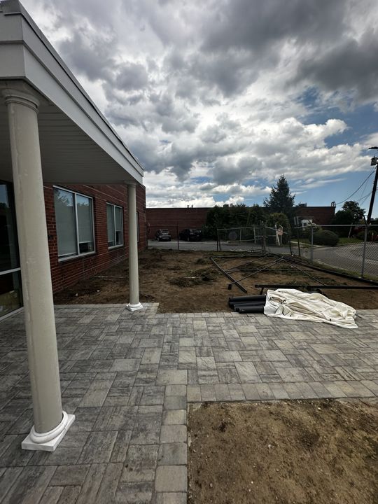New paver walk and beds in progress.