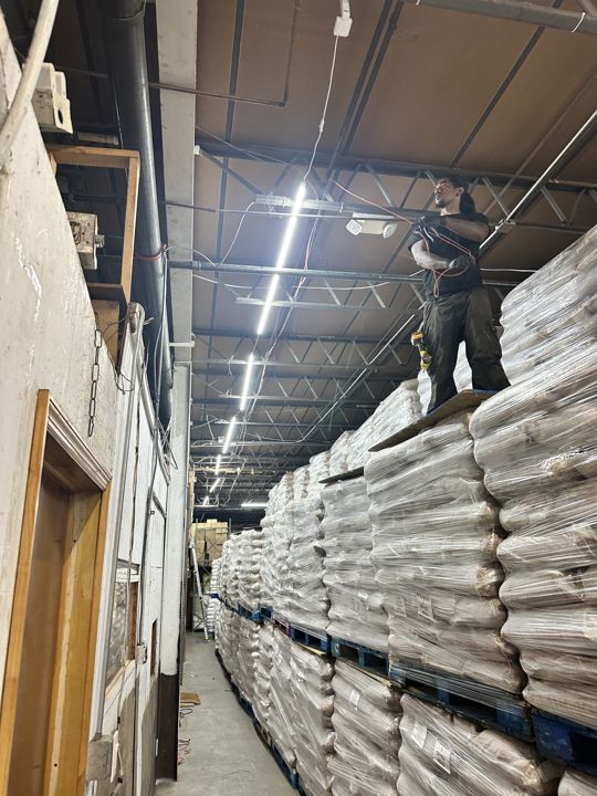 Lighting bays back on over loaded racking.