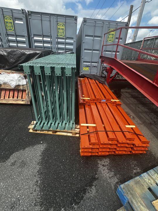 Racking beams staged for assembly.